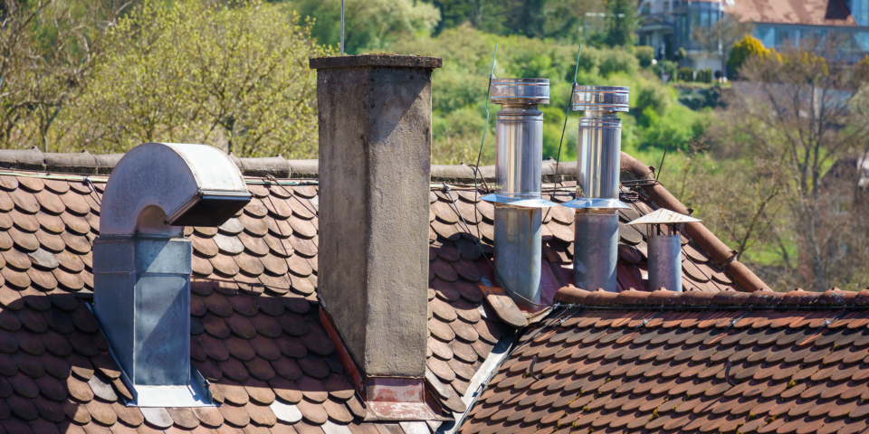 Roof with different chimneys